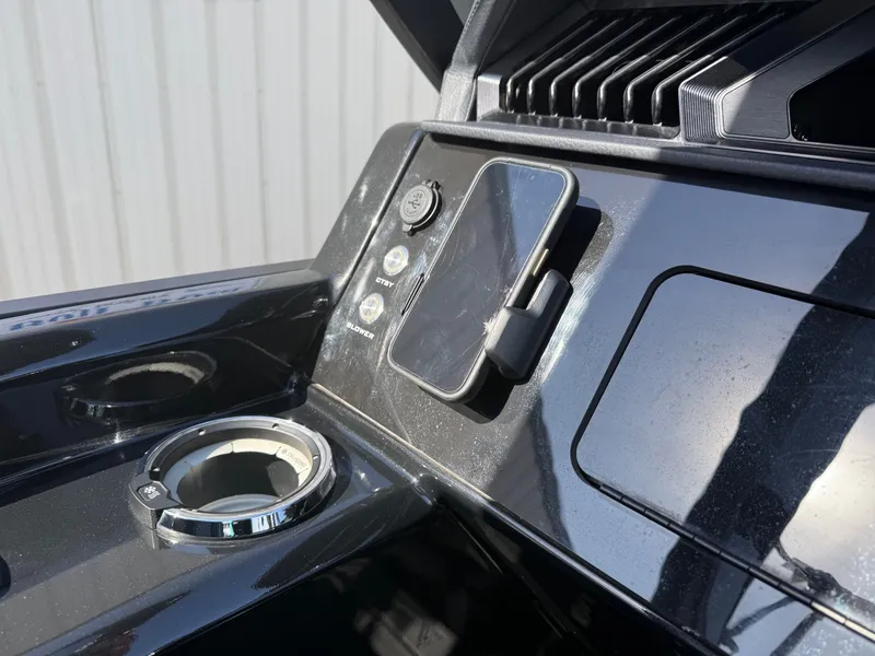 Slide: The Image of Viaggio Diamante 2024 dashboard with smartphone holder and cup holder. - 28