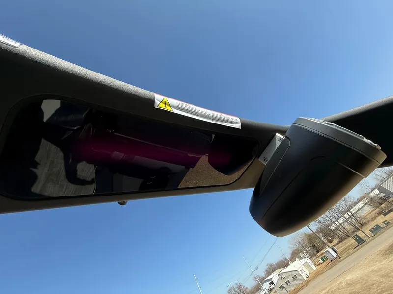 Slide: The Image of Viaggio Diamante 2024 rearview mirror under blue sky. - 48