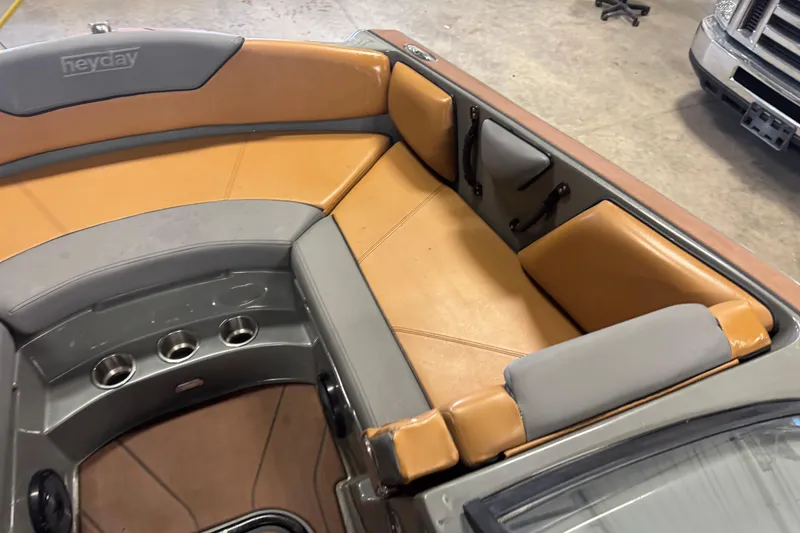 Slide: The Image of Interior of 2020 Heyday WT-2DC boat with tan and gray seating. - 10