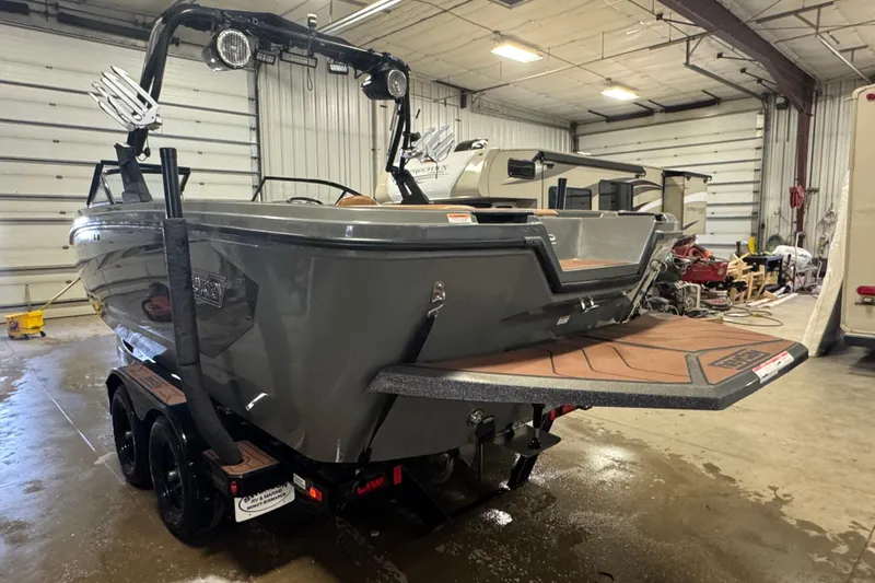 Slide: The Image of 2020 Heyday WT-2DC boat in a garage, showcasing sleek design and modern features. - 3