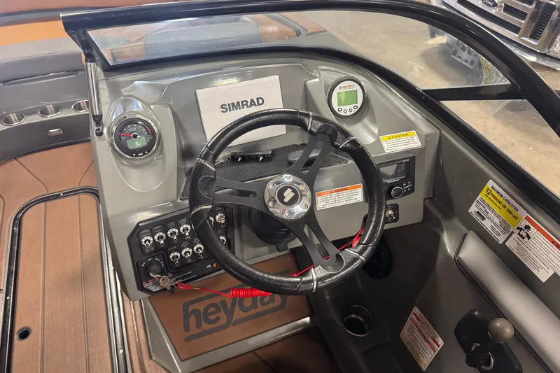 Slide: The Image of Steering console of 2020 Heyday WT-2DC boat with Simrad display and controls. - 6
