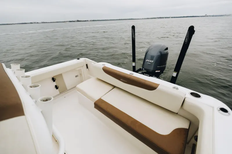 Slide: The Image of 2017 Robalo R222 Center Console boat with Yamaha 200 engine on water. - 5