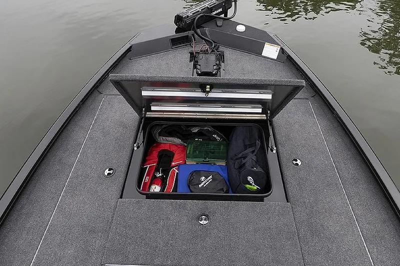 Slide: The Image of Manufacturer Provided Image: 2025 Lowe Stinger 195C boat storage compartment with organized gear. - 3
