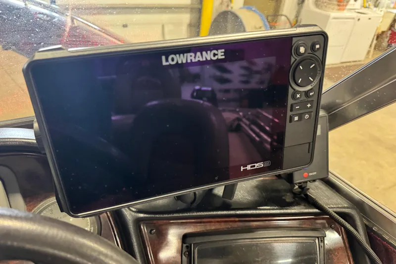 Slide: The Image of Lowrance HDS9 fishfinder on 2000 Ranger 620VS Fisherman boat dashboard. - 12
