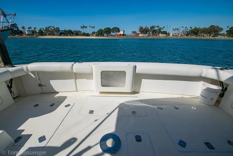 Slide: The Image of Cockpit view of 1989 Bertram 50 Convertible yacht with ocean backdrop. - 35