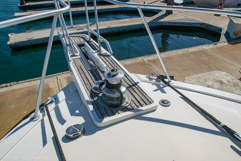 Slide: The Image of Bow of 1989 Bertram 50 Convertible yacht at marina dock. - 54