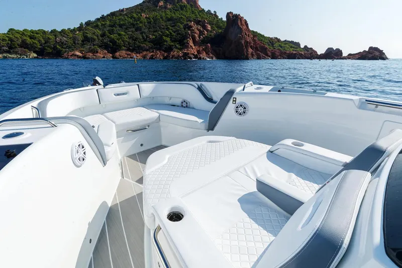Slide: The Image of Luxurious 2026 Wellcraft 38 T-Top boat interior with scenic ocean view. - 4