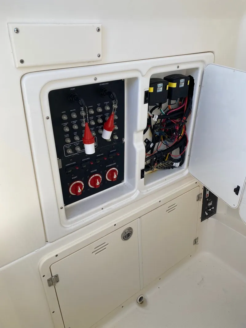 Slide: The Image of Electrical panel of a 2014 Boston Whaler 320 Outrage boat. - 10
