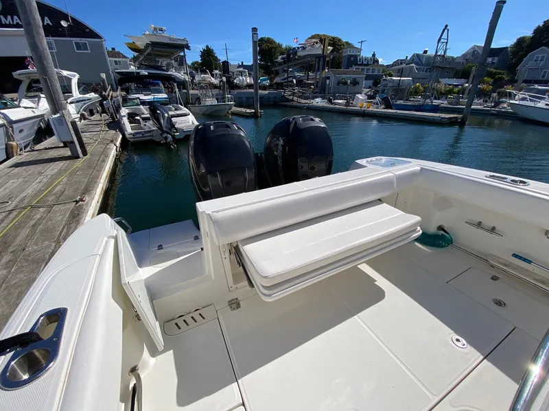 Slide: The Image of 2014 Boston Whaler 320 Outrage at dock with engines. - 12