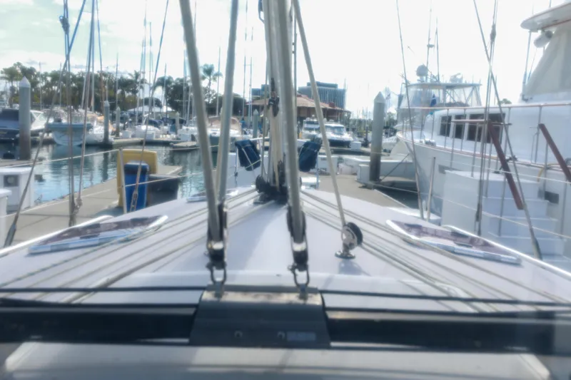 Slide: The Image of Catalina 375 sailboat docked at marina, surrounded by other boats, 2010 model. - 14