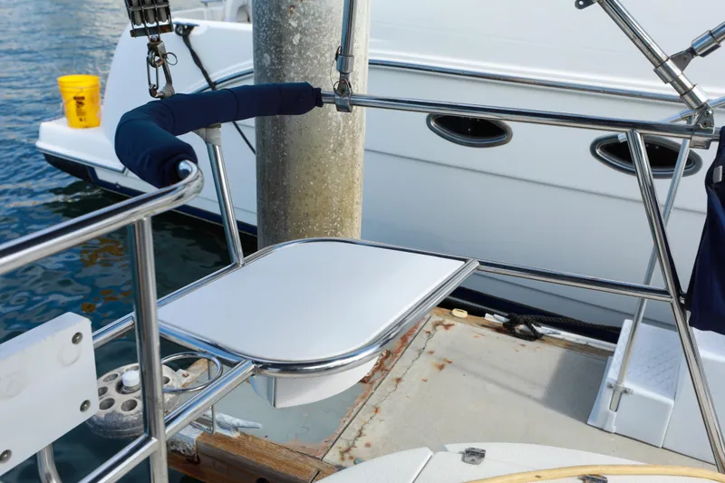 Slide: The Image of Catalina 375 sailboat deck detail with railing and dock, 2010 model. - 16