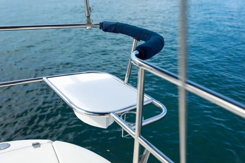 Slide: The Image of Catalina 375 sailboat deck detail with stainless steel railing, 2010 model, on calm water. - 17
