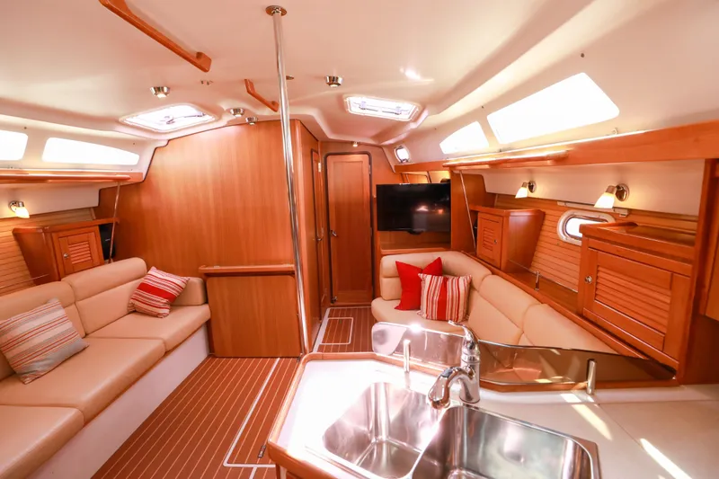Slide: The Image of Luxurious interior of 2010 Catalina 375 sailboat with cozy seating and modern amenities. - 31