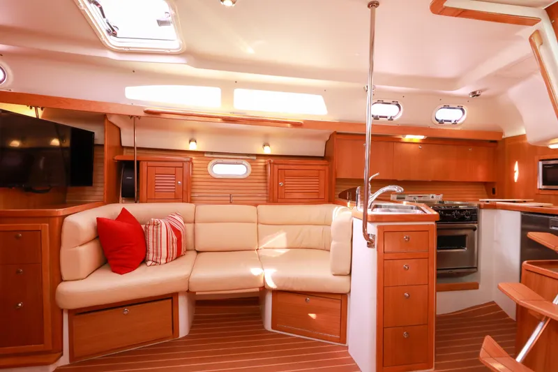 Slide: The Image of Luxurious interior of 2010 Catalina 375 yacht with cozy seating and modern kitchen amenities. - 35
