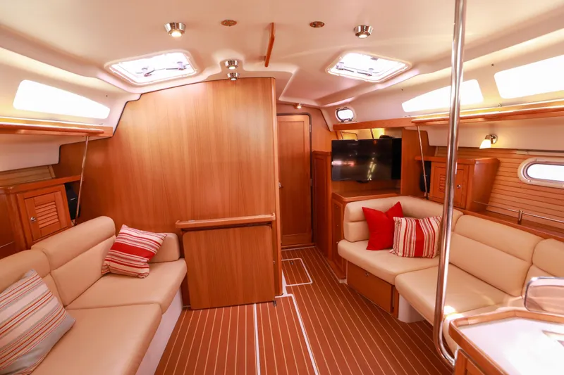Slide: The Image of Luxurious interior of a 2010 Catalina 375 sailboat with cozy seating and modern amenities. - 66