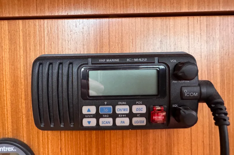 Slide: The Image of VHF marine radio IC-M422 on 2010 Catalina 375 yacht, mounted on wooden panel. - 67