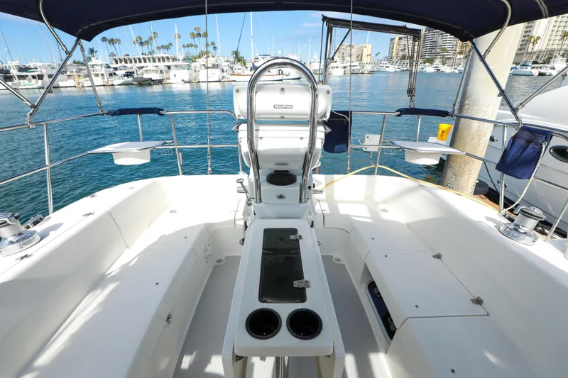 Slide: The Image of Cockpit view of a 2010 Catalina 375 sailboat docked in a marina. - 8