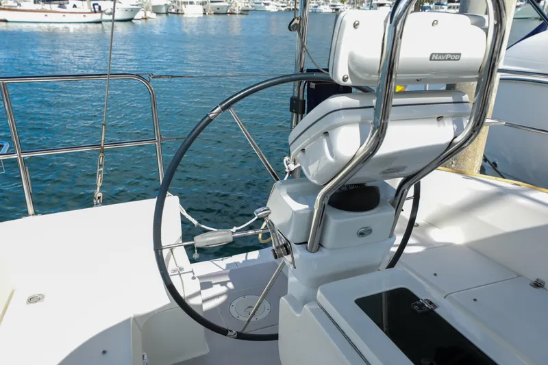 Slide: The Image of Cockpit of 2010 Catalina 375 sailboat with steering wheel and NavPod system. - 9