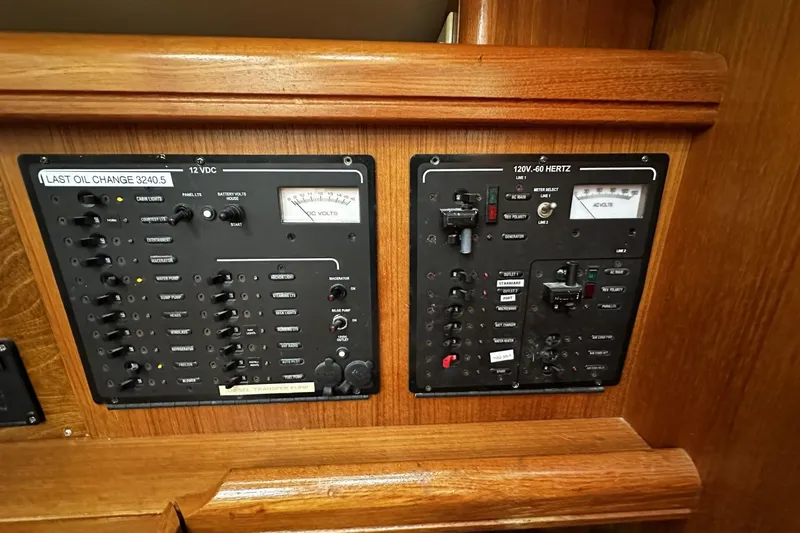 Slide: The Image of Electrical control panel on a 2004 Hunter 41 Aft Cockpit sailboat. - 22