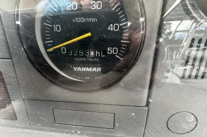 Slide: The Image of Yanmar engine hour meter showing 3253 hours on a 2004 Hunter 41 Aft Cockpit. - 36