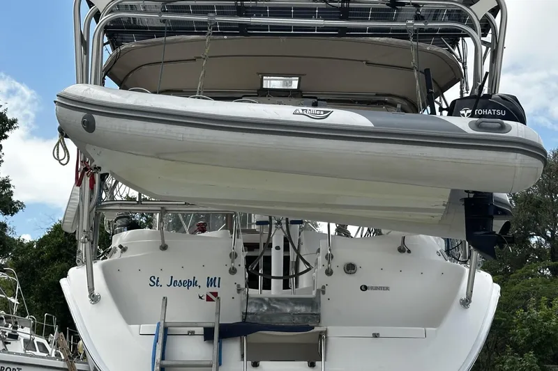 Slide: The Image of 2004 Hunter 41 Aft Cockpit yacht with dinghy, docked in St. Joseph, MI. - 39