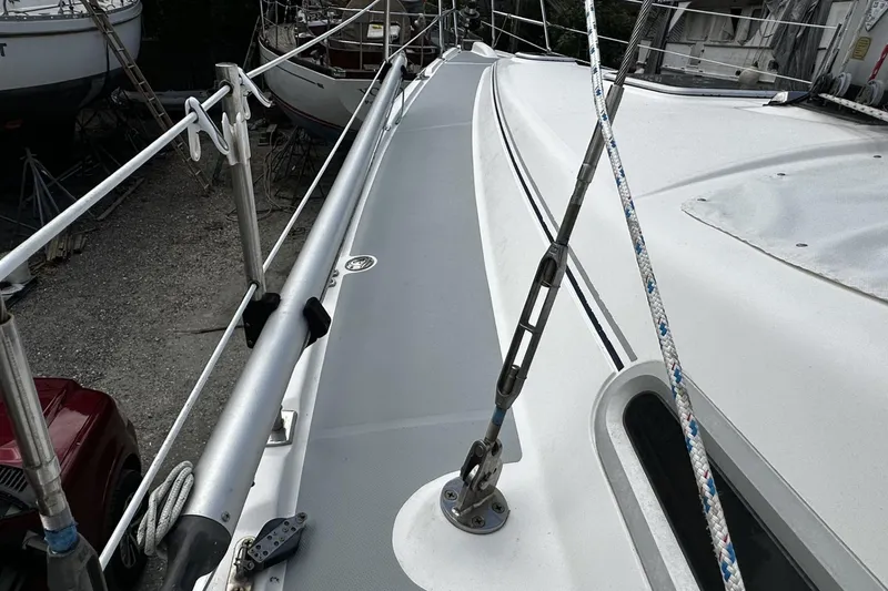 Slide: The Image of 2004 Hunter 41 Aft Cockpit sailboat deck with rigging and railing details. - 45