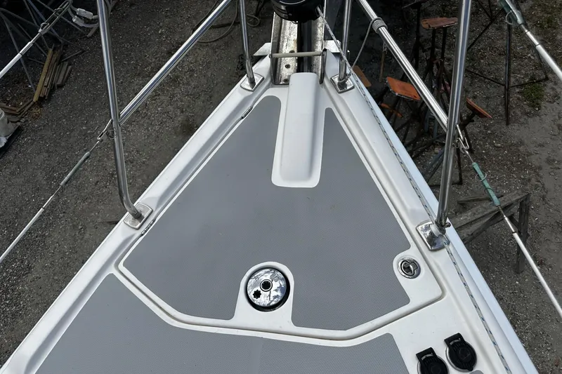 Slide: The Image of Bow deck of 2004 Hunter 41 Aft Cockpit sailboat with stainless steel railings. - 48