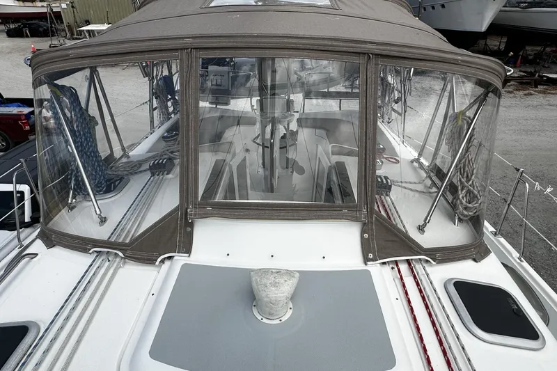 Slide: The Image of 2004 Hunter 41 Aft Cockpit sailboat with enclosed cockpit and visible deck details. - 5