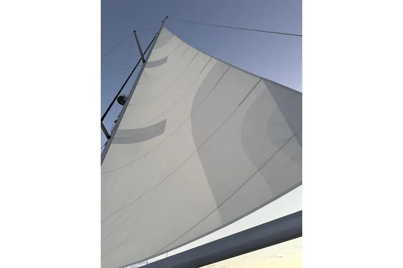 Slide: The Image of Sail of 2004 Hunter 41 Aft Cockpit yacht against clear sky. - 53