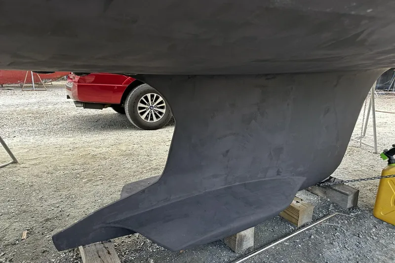 Slide: The Image of Keel of a 2004 Hunter 41 Aft Cockpit sailboat on dry dock. - 58