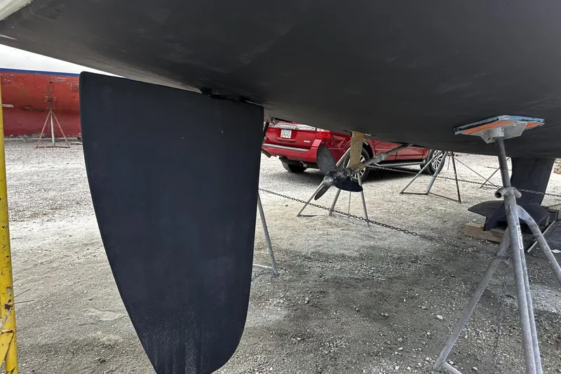 Slide: The Image of Underwater view of 2004 Hunter 41 Aft Cockpit sailboat's rudder and propeller. - 60
