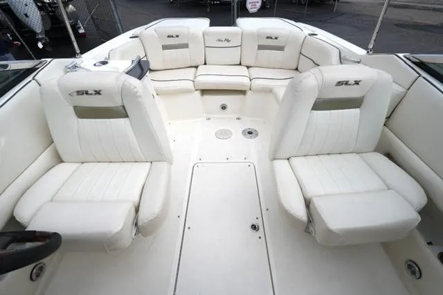 Slide: The Image of Interior view of 2007 Sea Ray SLX 250 boat with white seating. - 8