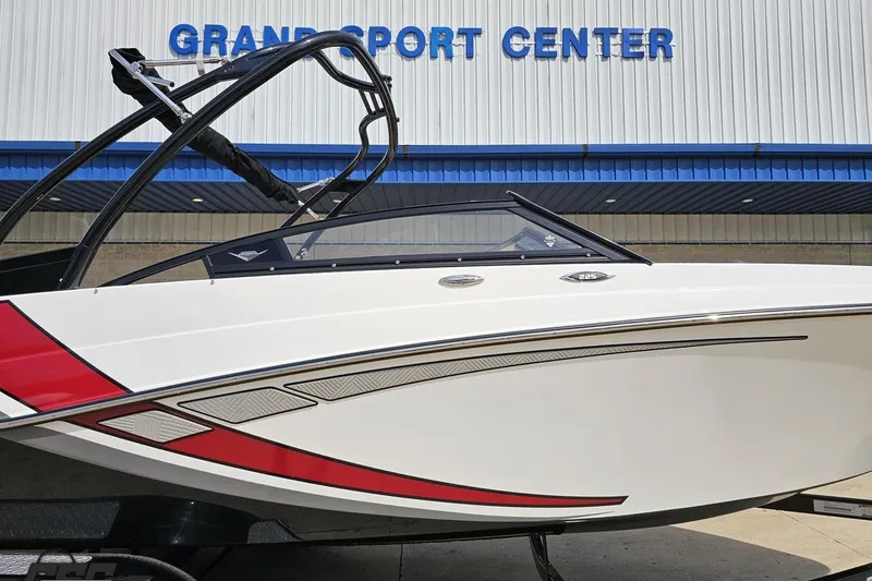 Slide: The Image of 2020 Glastron GTS 225 boat displayed at Grand Sport Center. - 4