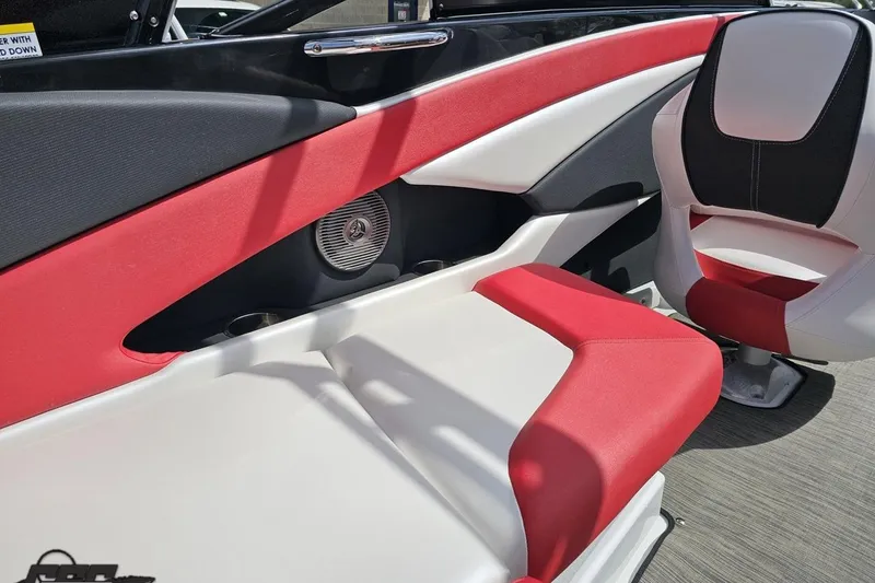 Slide: The Image of 2020 Glastron GTS 225 boat interior with red and white seating, modern design. - 54