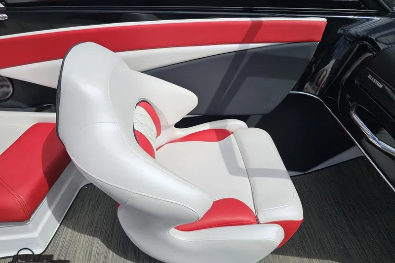 Slide: The Image of 2020 Glastron GTS 225 boat interior with red and white seating. - 57