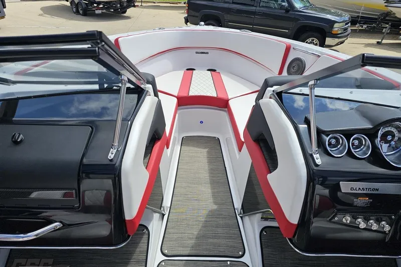 Slide: The Image of Interior view of 2020 Glastron GTS 225 boat with red and white seating. - 70