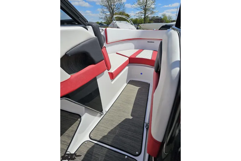Slide: The Image of 2020 Glastron GTS 225 boat interior with red and white seating, modern design. - 71