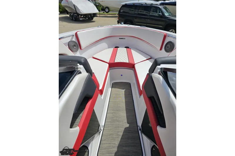 Slide: The Image of 2020 Glastron GTS 225 boat interior with red and white seating, modern design. - 72