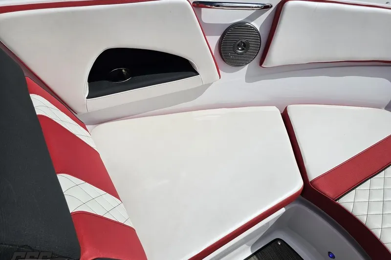 Slide: The Image of 2020 Glastron GTS 225 boat interior with red and white seating. - 79