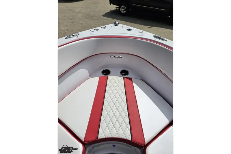 Slide: The Image of 2020 Glastron GTS 225 boat interior with red and white seating. - 83