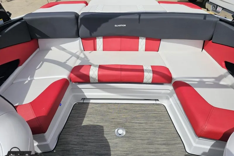 Slide: The Image of 2020 Glastron GTS 225 boat interior with red and white seating. - 89