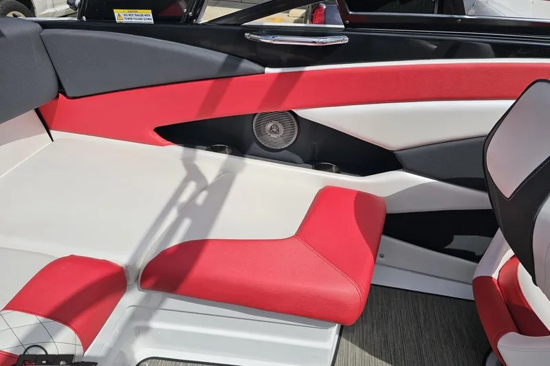 Slide: The Image of Interior of a 2020 Glastron GTS 225 boat with red and white seating. - 91