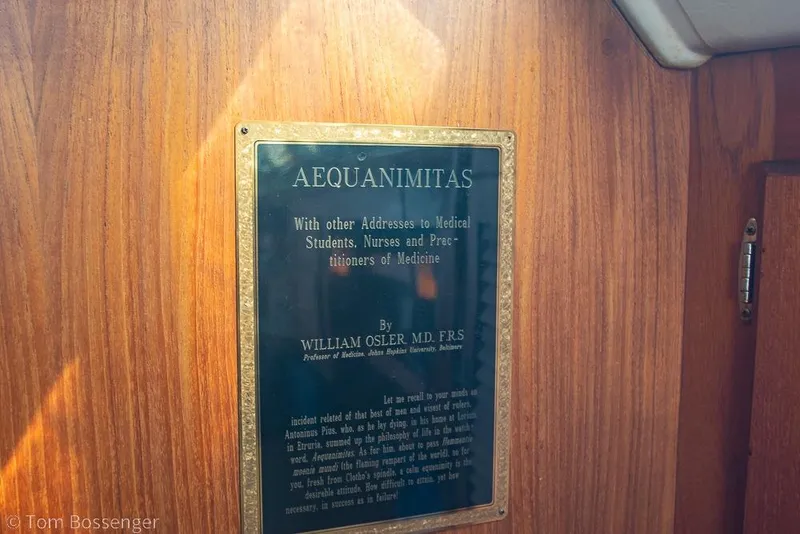 Slide: The Image of Plaque on Catalina 36 sailboat featuring "Aequanimitas" by William Osler, 1987 model. - 19