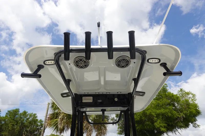 Slide: The Image of 2026 Sea Hunt Ultra 245 SE boat top view with rod holders and speakers. - 19