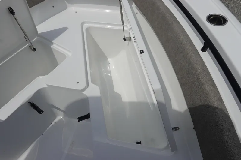Slide: The Image of 2026 Sea Hunt Ultra 245 SE boat interior storage compartment. - 33