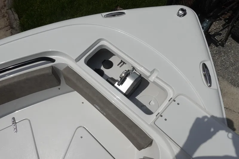 Slide: The Image of Bow storage compartment on 2026 Sea Hunt Ultra 245 SE boat. - 36