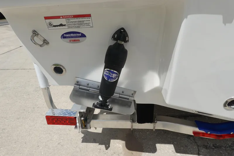 Slide: The Image of 2026 Sea Hunt Ultra 245 SE boat transom with trim tab and Yamaha PowerMatched system. - 6