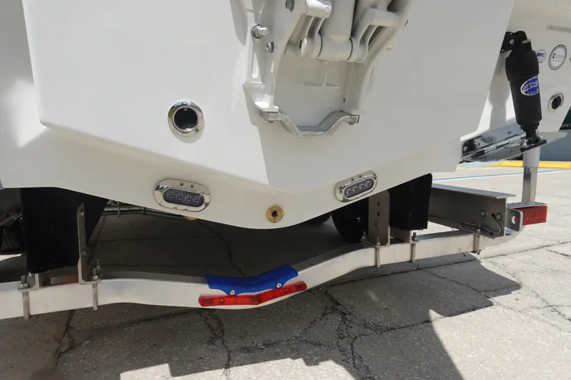 Slide: The Image of Rear view of 2026 Sea Hunt Ultra 245 SE boat on trailer. - 7