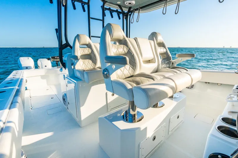 Slide: The Image of Luxurious seating on a 2022 Freeman 42LR boat, overlooking the ocean. - 37