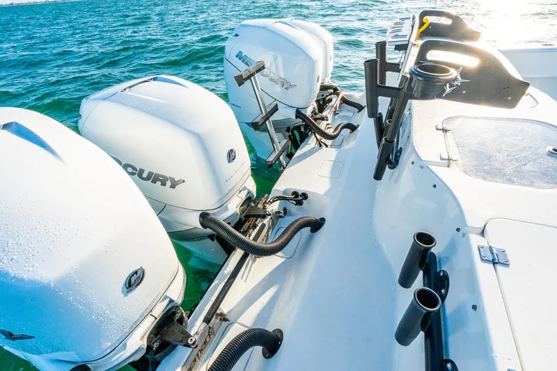 Slide: The Image of Freeman 42LR 2022 boat with Mercury outboard engines on blue water. - 53